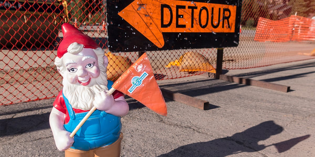 Construction gnome with Frisco flag and detour sign