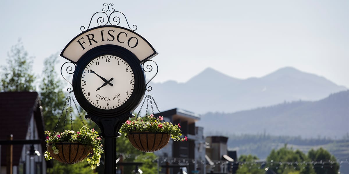 Close up of the Frisco Clock with flower pots