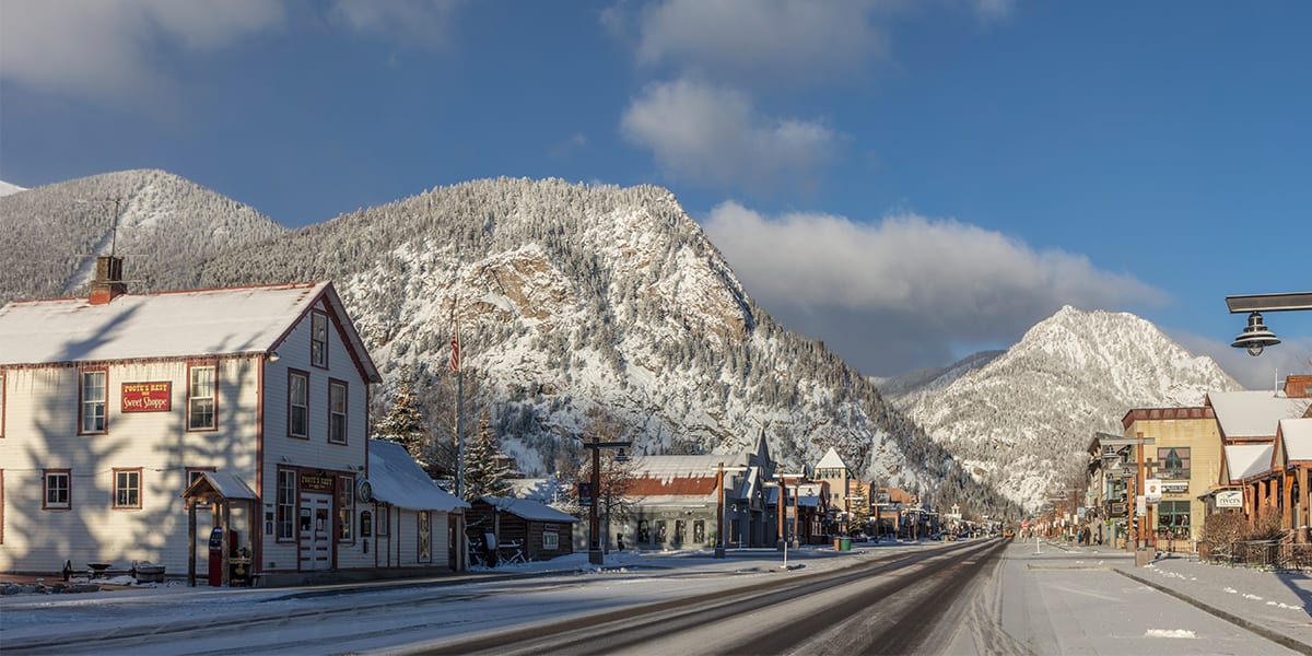 Frisco Main Street in winter with snow with Foote's Rest and Mount Royal