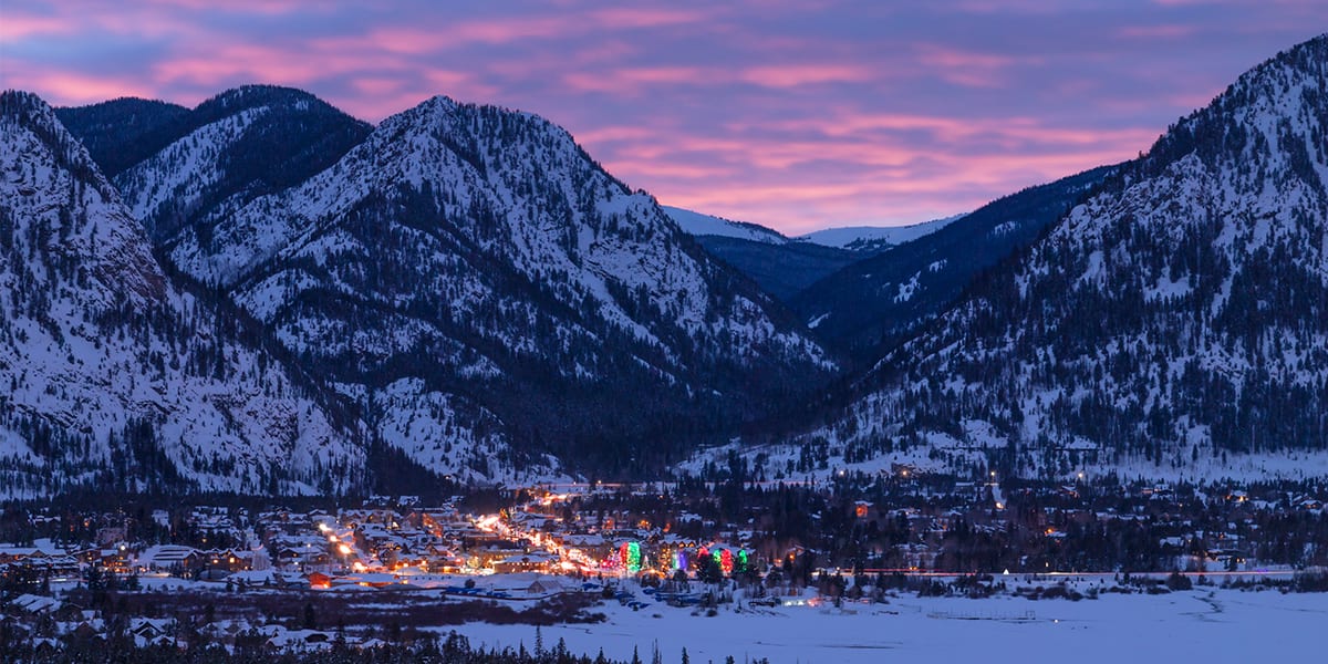 Frisco from afar in winter with sunset and lights