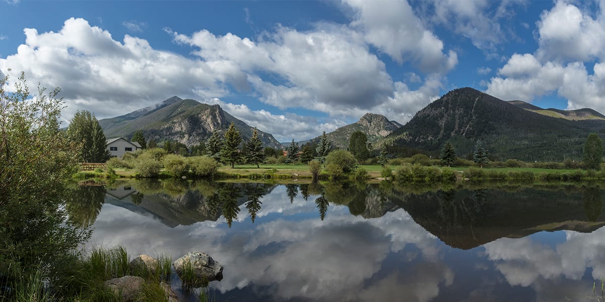 Meadow Creek Pond with reflection of mountains