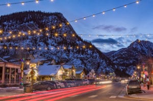 Frisco Main Street and Fourth Avenue snowy with lights