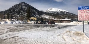 3rd and Granite parking lot with snow and Buffalo Mountain in the background