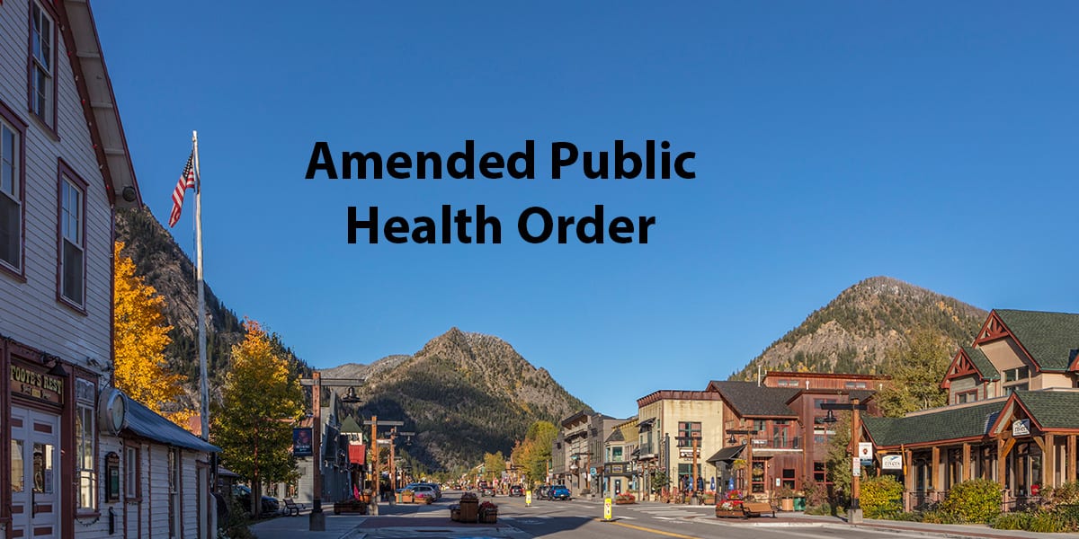 Frisco Main Street during fall looking west the the copy "Amended Public Health Order"