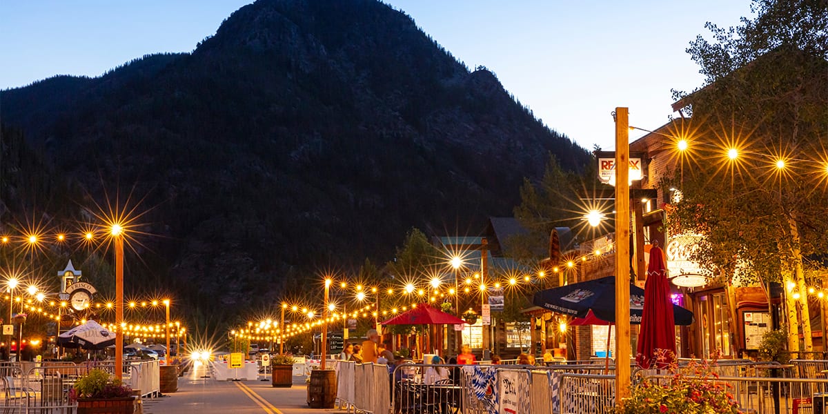 Dusk with silhouette of Mt. Royal at the Frisco Pedestrian Promenade