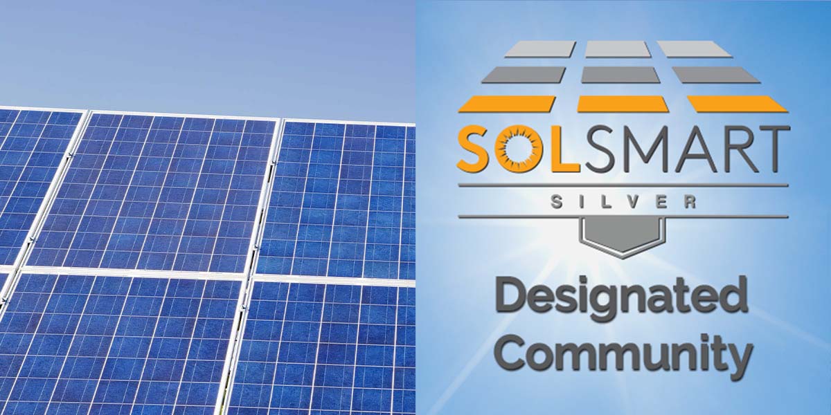 Solar panels with SolSmart logo