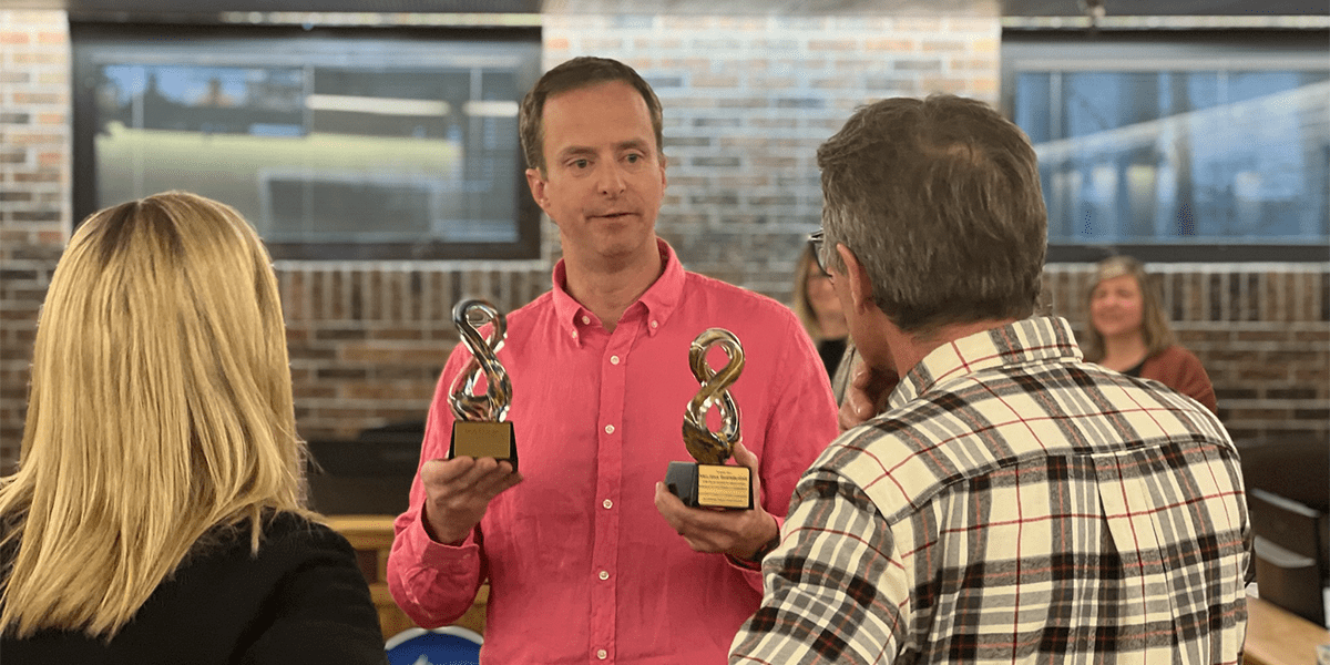 Mayor Mortensen presenting appreciation gifts to outgoing Councilmembers Melissa Sherburne and Dan Fallon