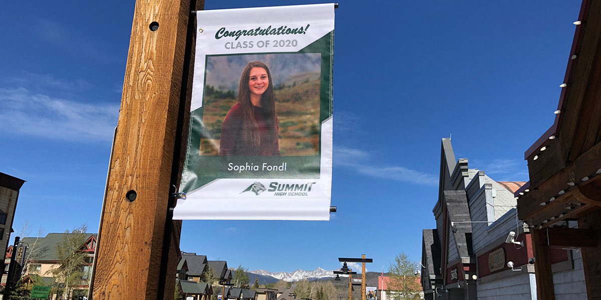 Banner of graduating senior in 2020 on lamp post on Frisco Main Street