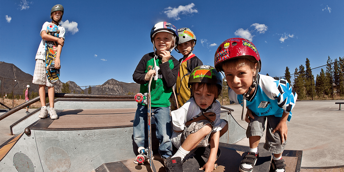 Rounded lens shot of kids on skate boards at the Frisco Skate Park