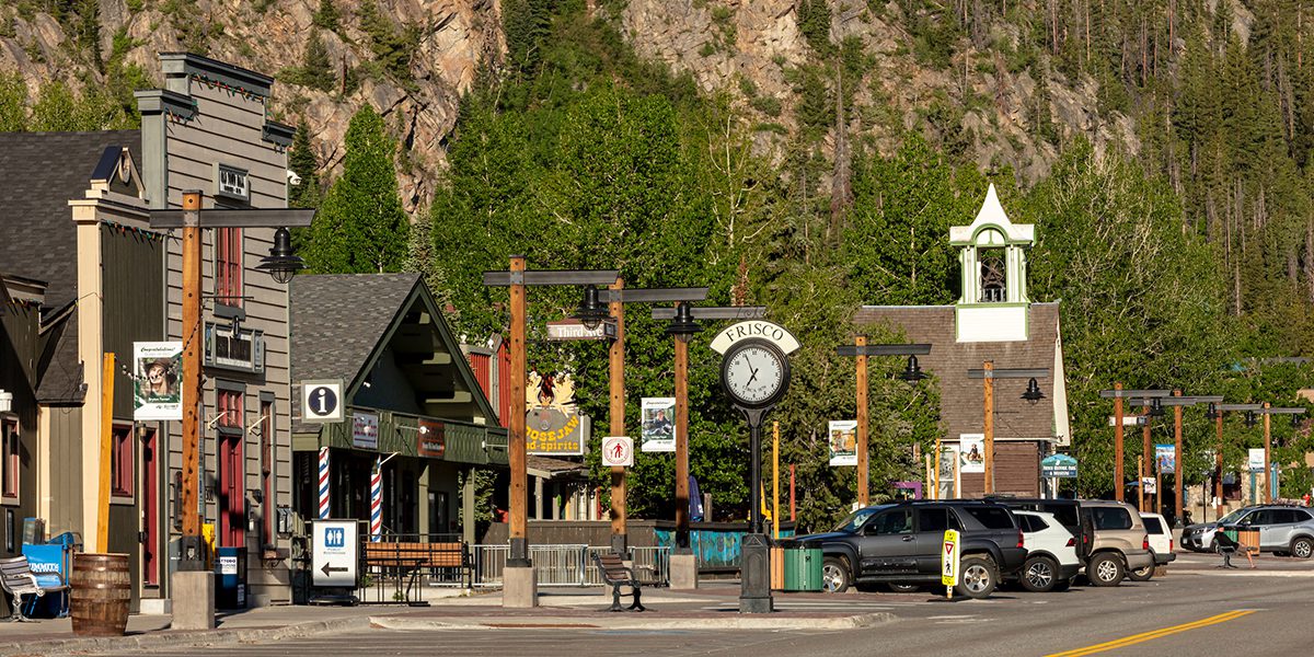 Frisco Main Street with Clock Tower and Mountains in the Background